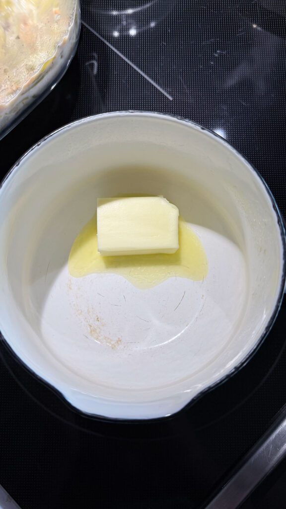 butter melting in pot on stove
