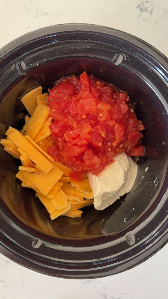 can of rotel added to crockpot.