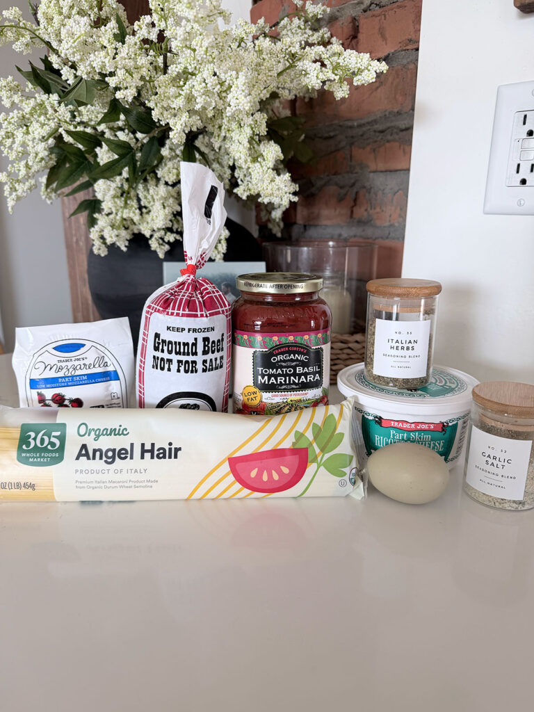 spaghetti pie ingredients on white countertop