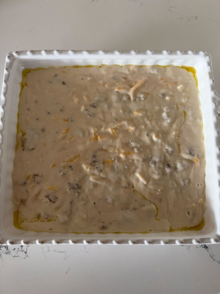 A white baking dish with pancake sausage casserole.