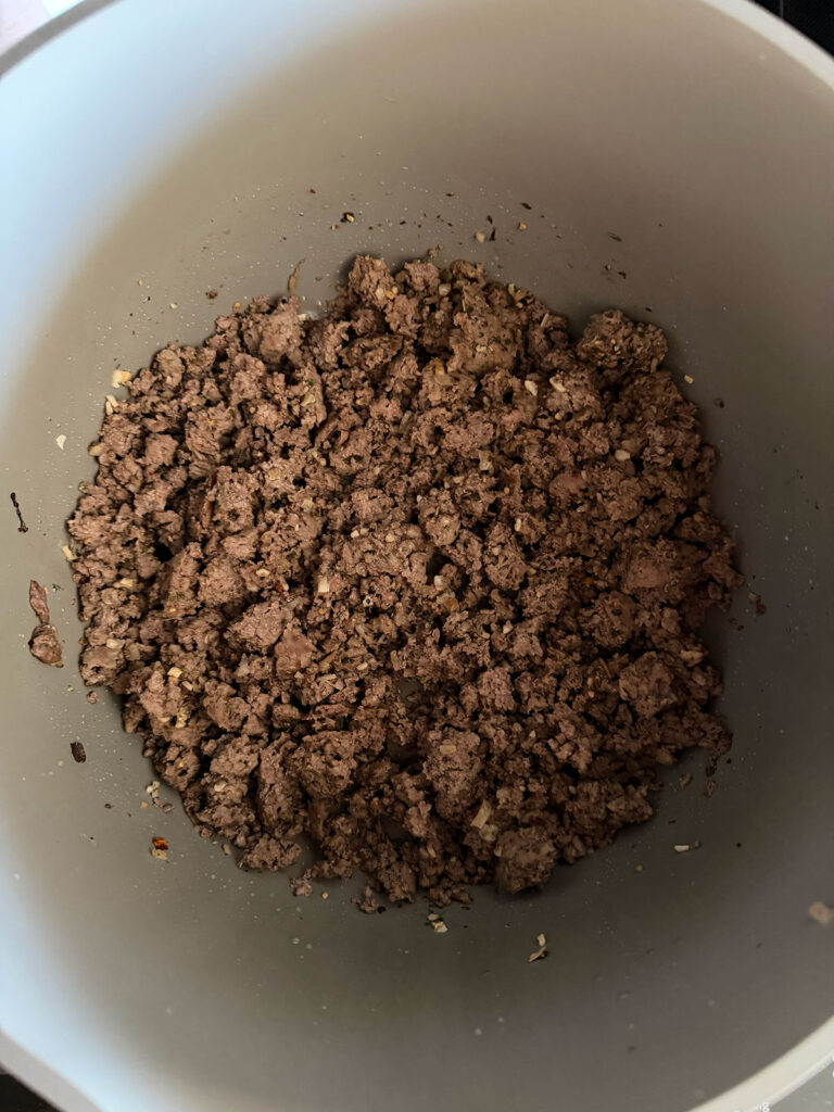 browned ground beef in pot