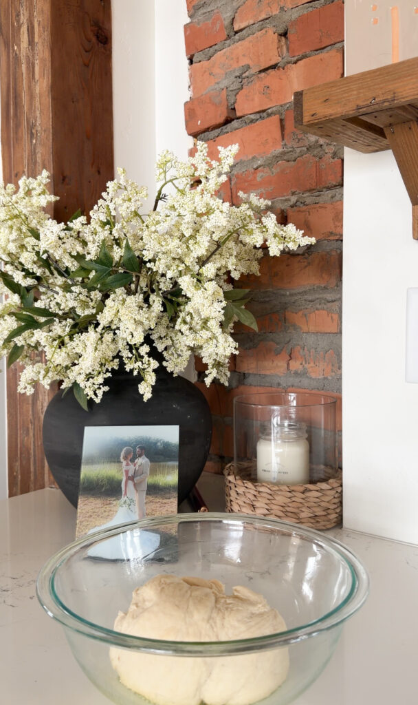 dough in greased bowl.