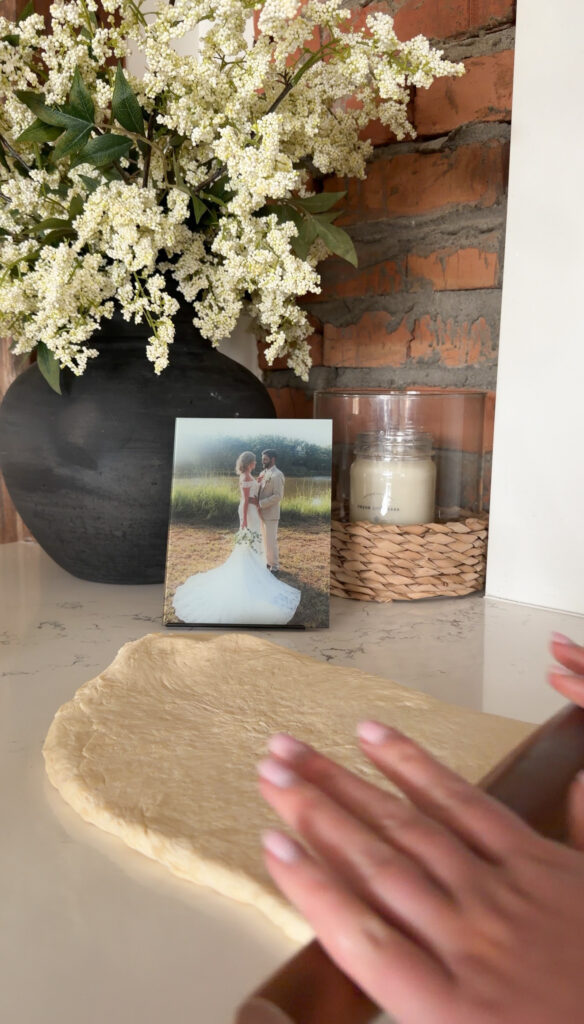 rolling out the dough into a rectangle