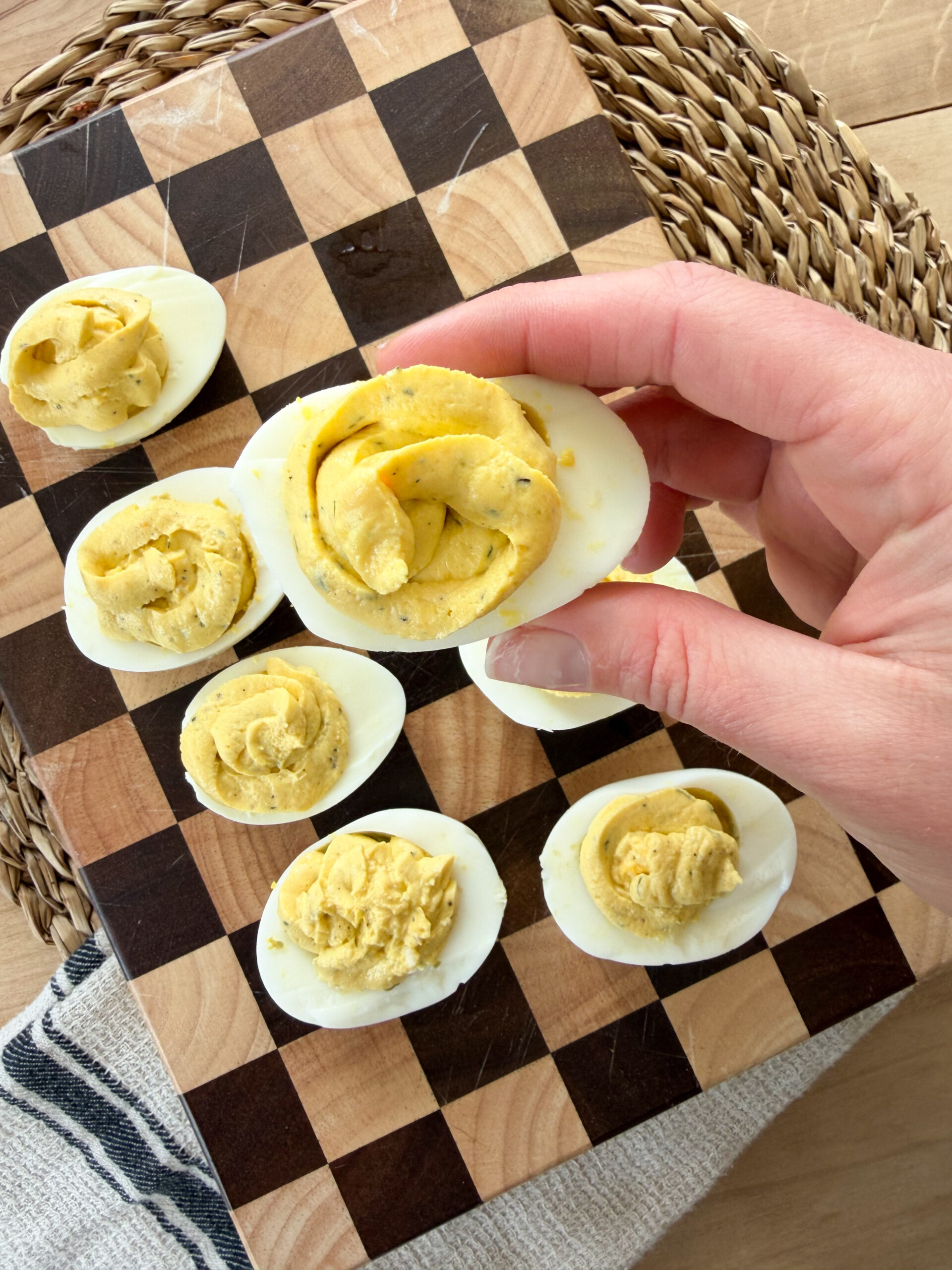 deviled egg in hand