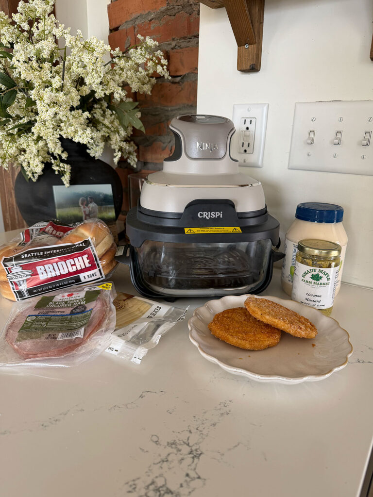chicken cordon bleu sandwich ingredients on counter