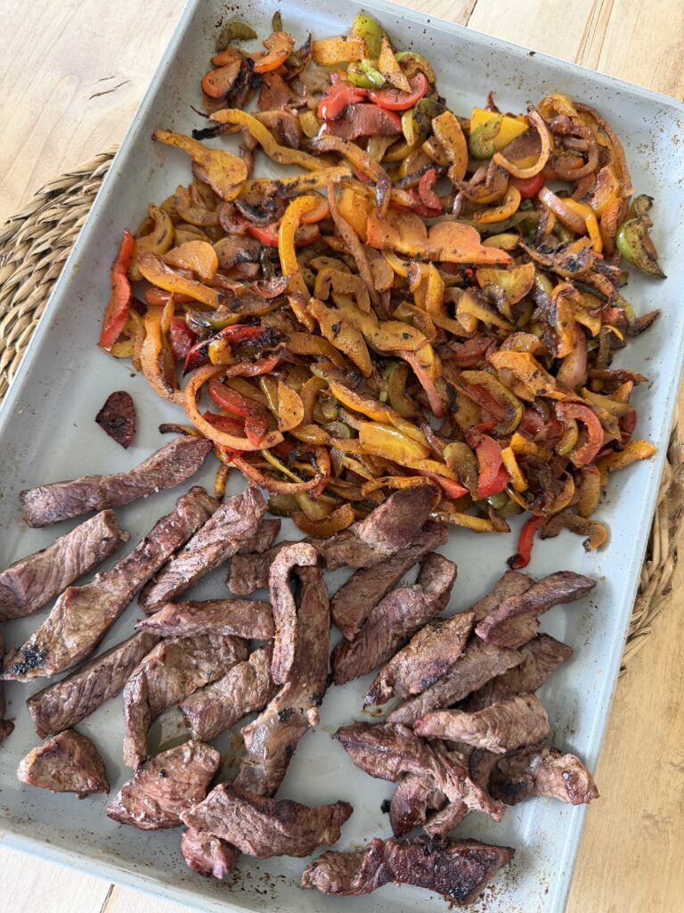 veggies and meat on a pan