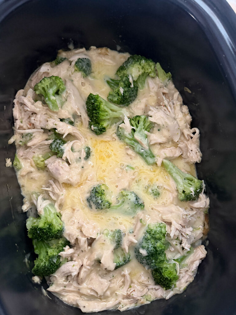 cooked chicken divan mixture in base of crockpot