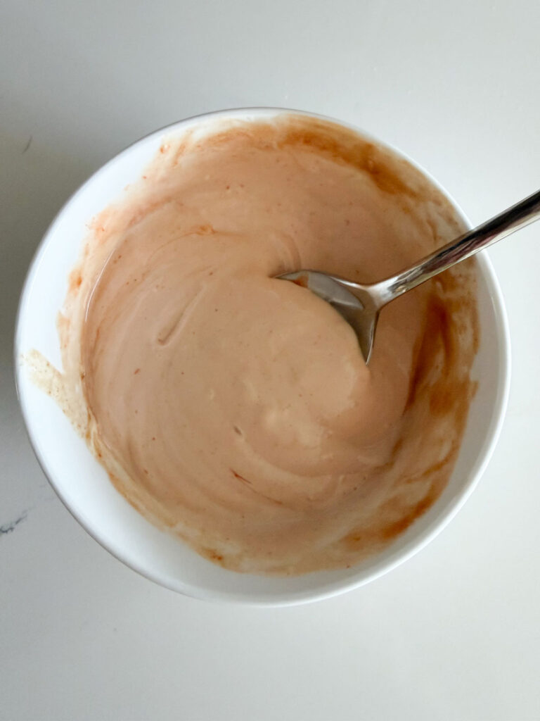 fry sauce mixed together in white bowl with spoon