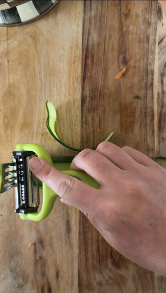 slicing the cucumber
