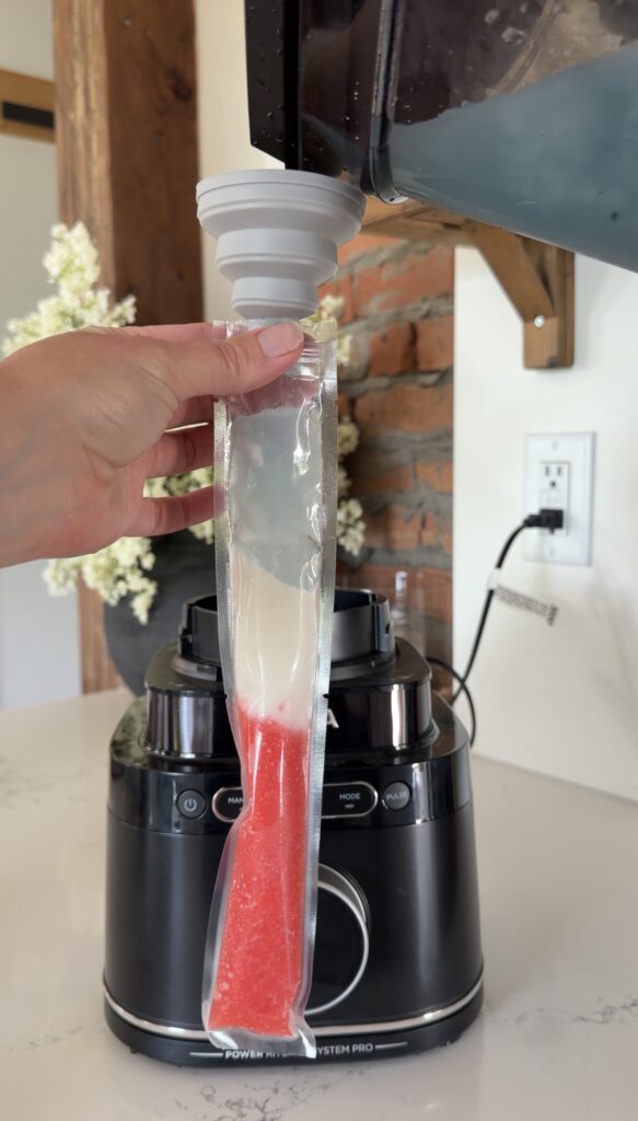 pour blue mix into freeze pop