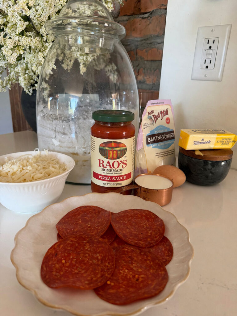 pizza muffin ingredients on counter