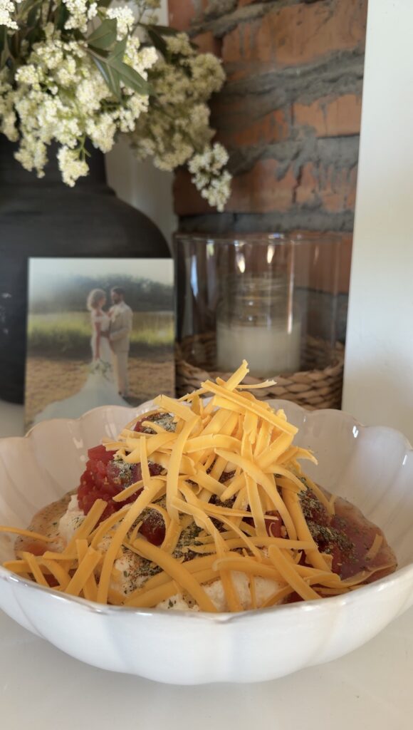 topped with shredded cheese