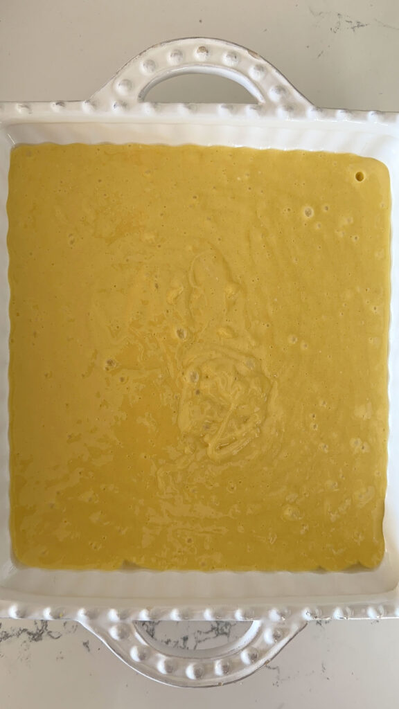 apple pie cake batter, unbaked, in baking dish