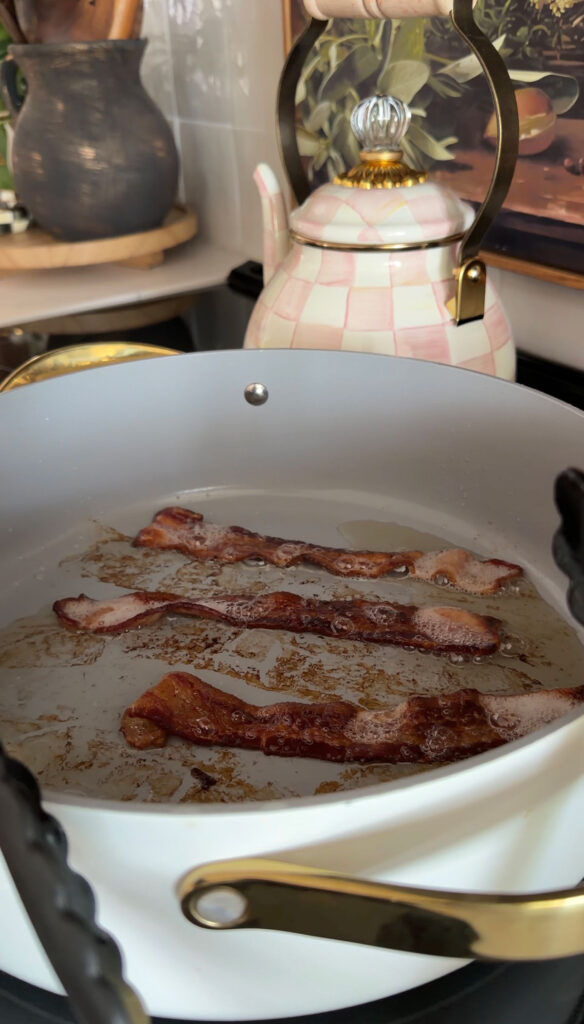 bacon cooking in pan