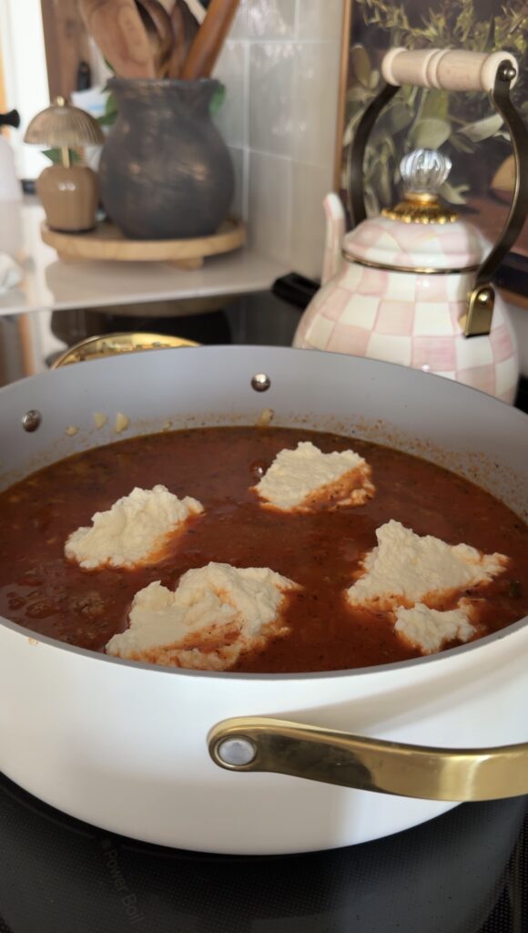 adding in the ricotta