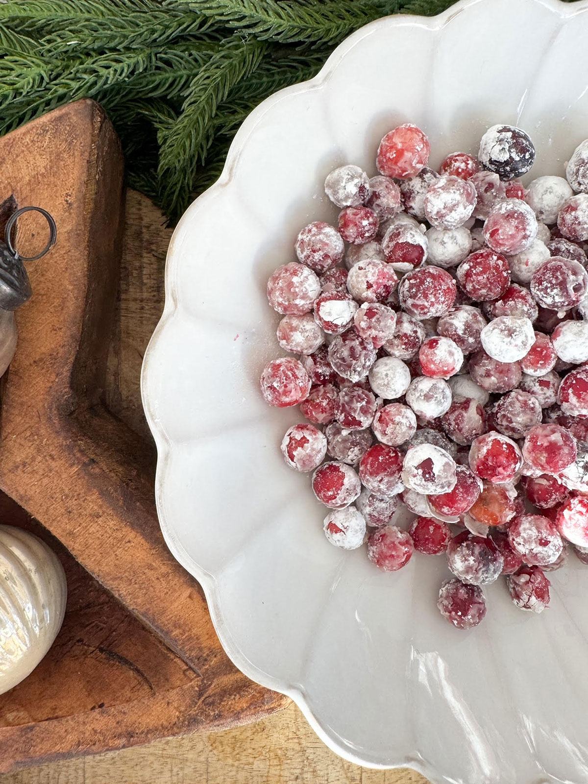 sugared cranberries in white serving dish