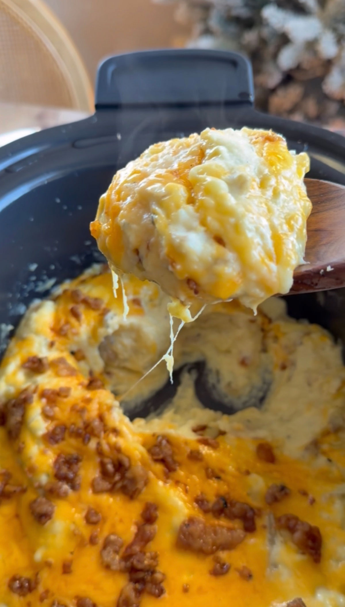 wooden spoonful of loaded mashed potatoes