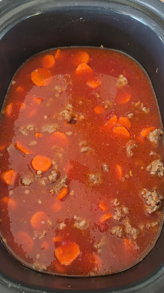 sausage, veggies and broth in slow cooker