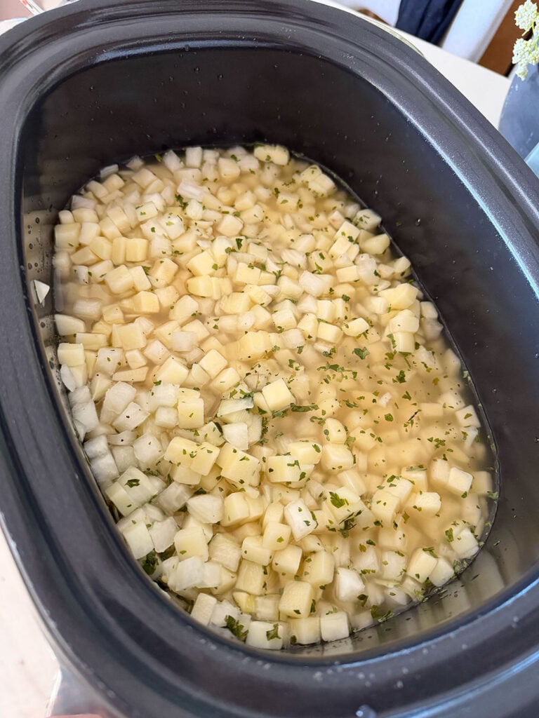 cooked, diced potatoes in slow cooker
