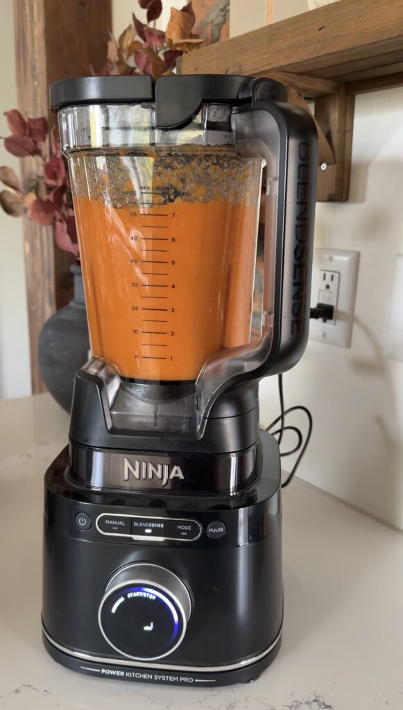 veggies being blended after cooked