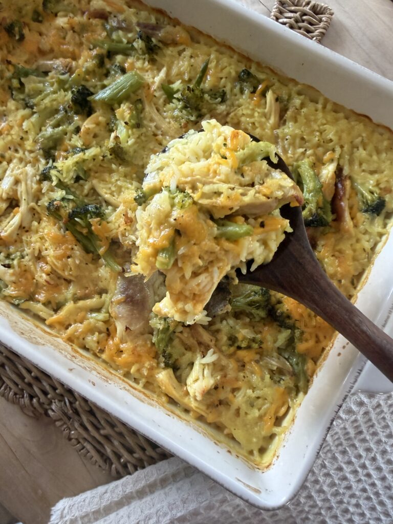casserole being scooped out of pan