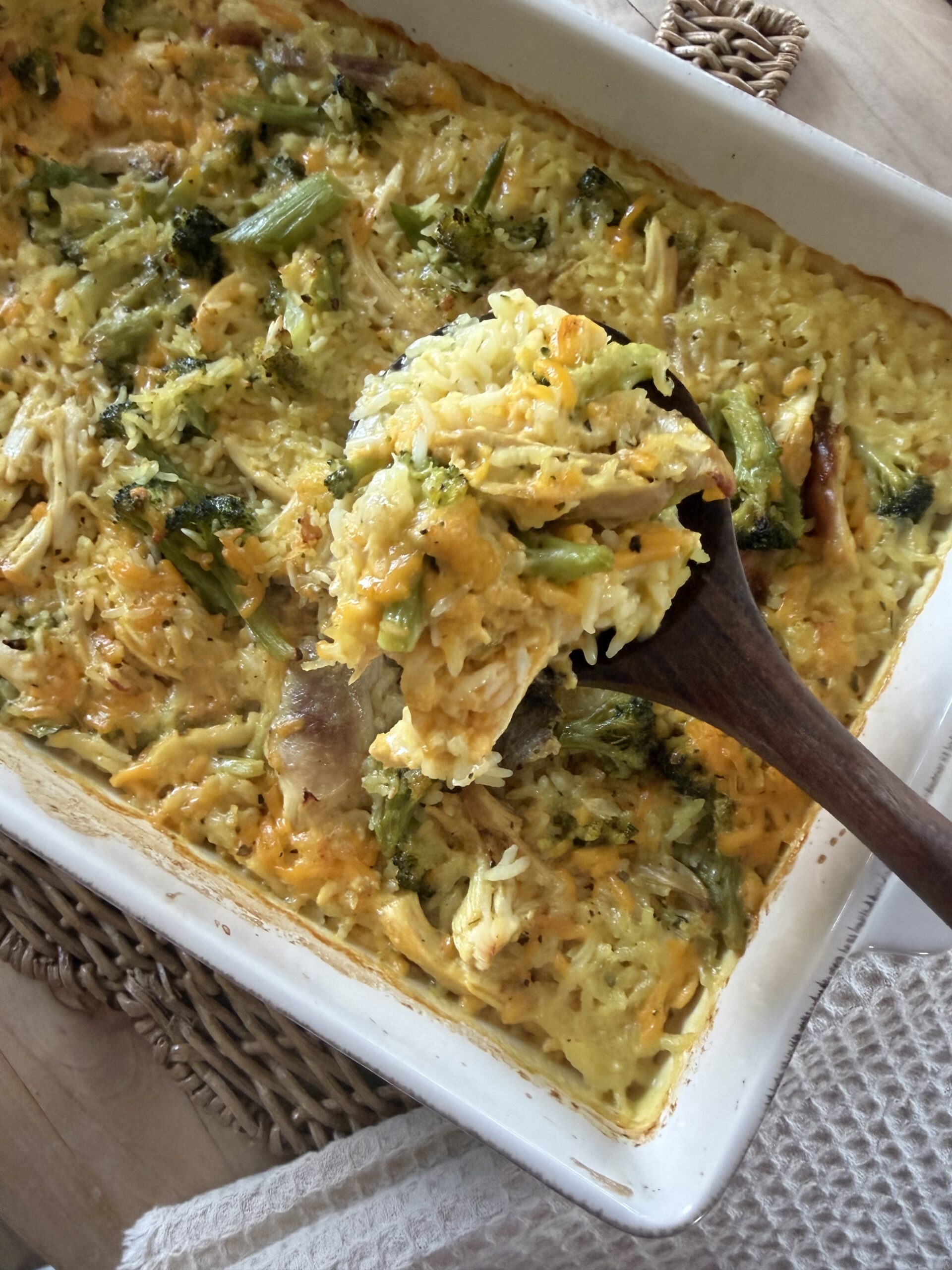 casserole being scooped out of pan